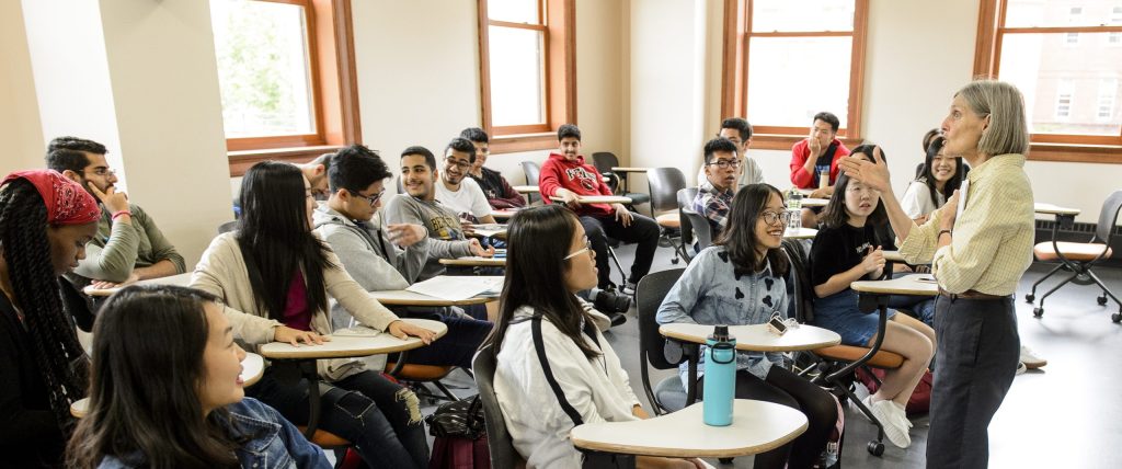 A group of 25 first-year international students list to Gail Ibele, former associate director of the English as a Second Language (ESL) program, talks during an International Student Summer Institute class session at the University of Wisconsin-Madison on Aug. 4, 2017.
