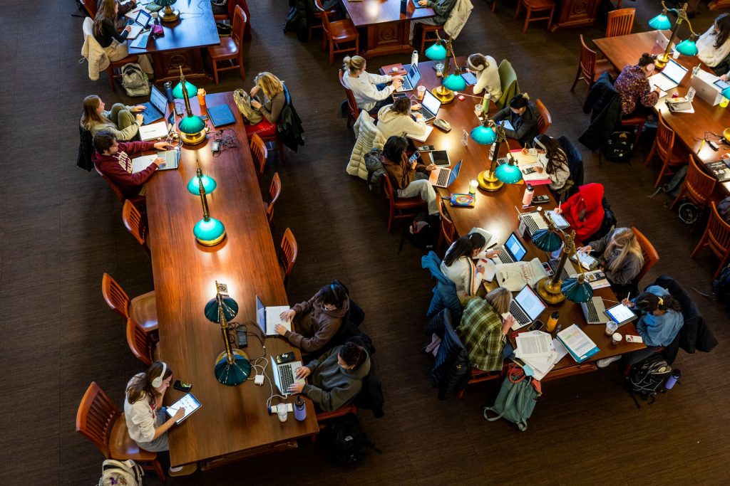 Students are studying at the library inside the Historical Society-Library.